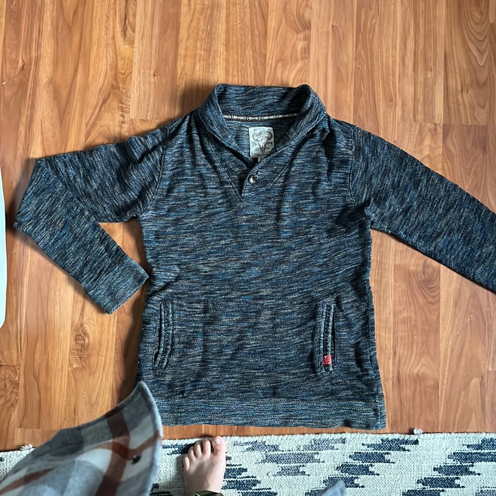 Blue pullover sweater, men’s size medium. From Macy’s.